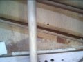 Notice the stains from new glue along the braces Bridge Doctor is vertical post Under it is the plate
