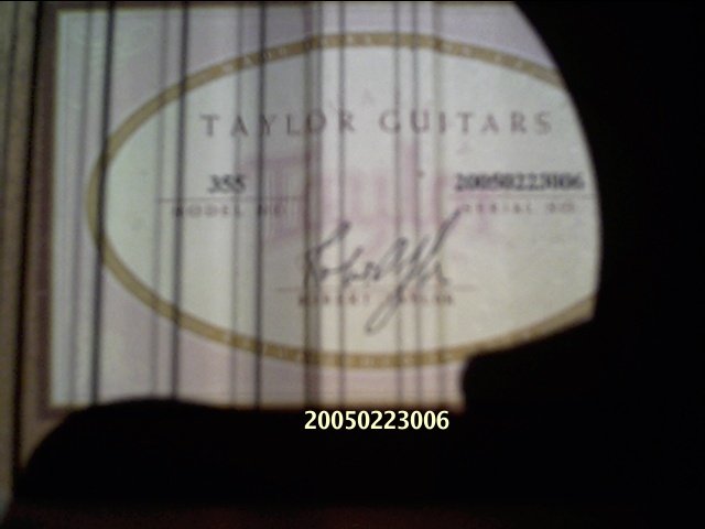 image title is /guitars/Taylor 355 inside label indicates made in Feb 2005