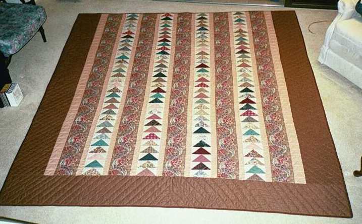 image title is Flying Geese - Hand pieced and quilted, 1991