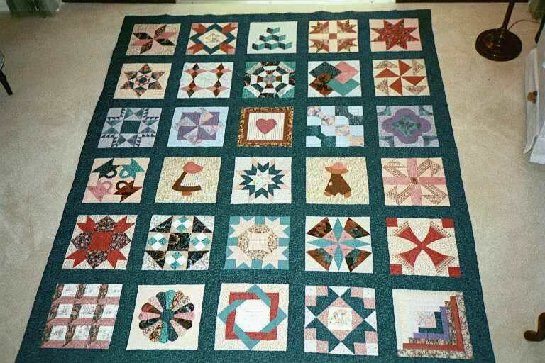 image title is Sampler Quilt - Hand pieced and quilted, 1993