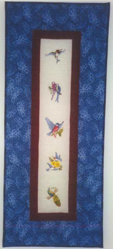 image title is Feathered Friends, Machine Embroidery, 1998